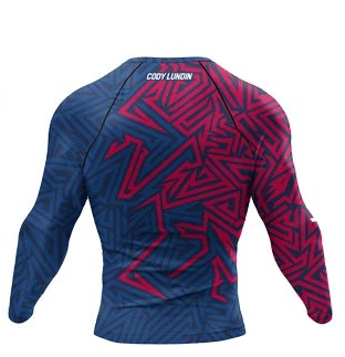 Blue and red long-sleeve athletic shirt with 'Cody Lundin' branding on a white background